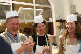 Tauck employees enjoying a cooking class