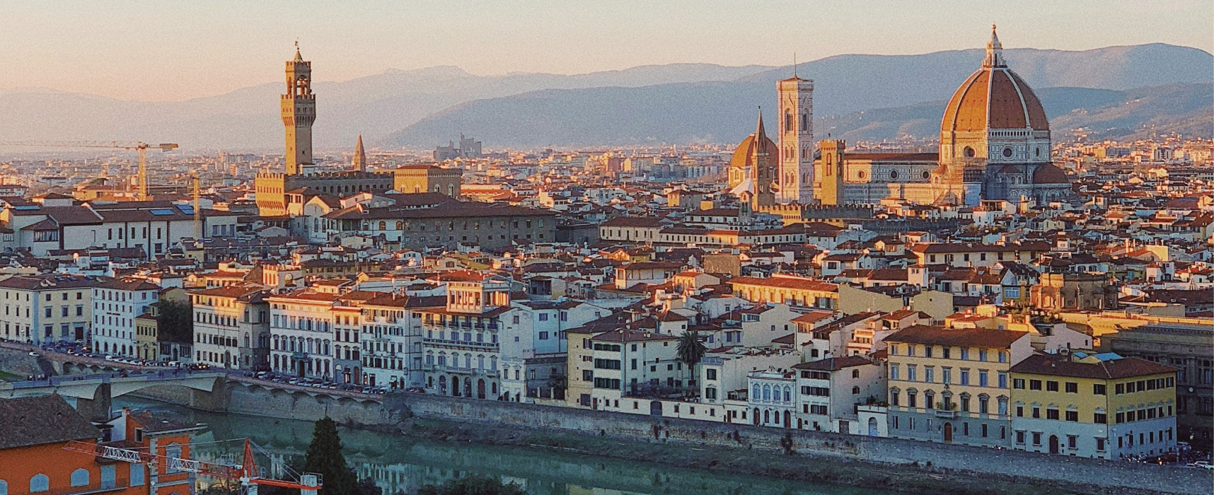 Panoramic view of Florence skyline with the Duomo and historic city center at sunset